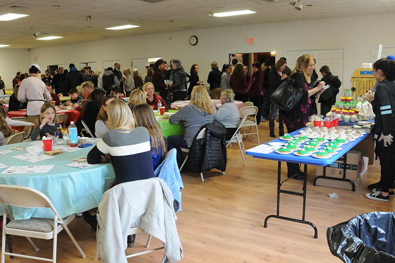 The Empty Bowls benefit, Photo: A family from John M. Marshall Elementary School, Photo: Richard Lewin Photography
