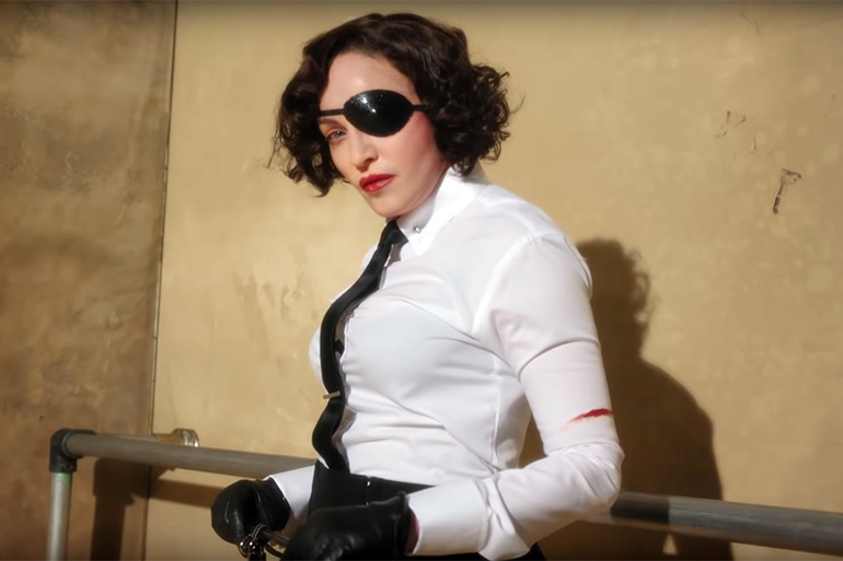 Madonna as Madam X in her "Welcome to the World of Madame X" promo video