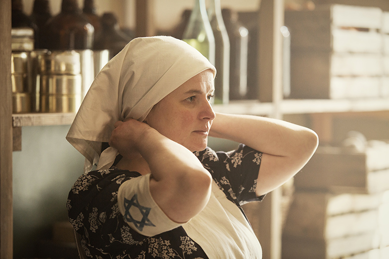 Actor Jowita Budnik portrays Rachel Auerbach in Soup Kitchen in "Who Will Write Our History"