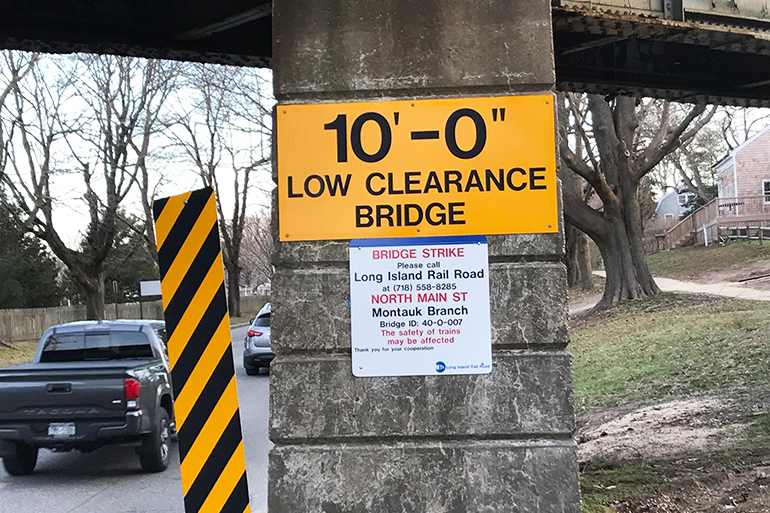 East Hampton railroad overpass sign