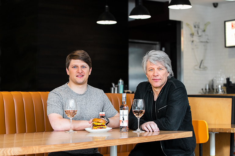 Jesse Bongiovi and Jon Bon Jovi with the Hampton Burger