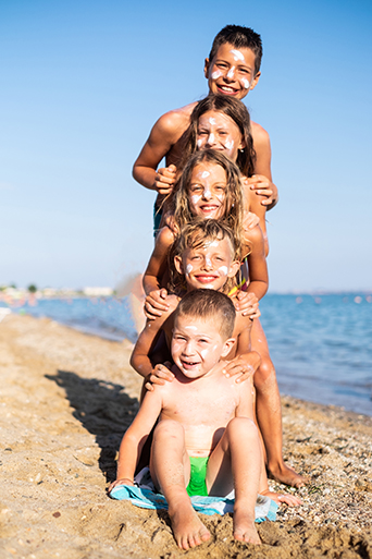 Children playing at the beach