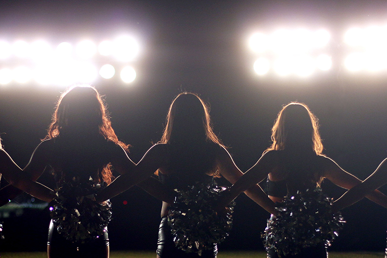 Cheerleaders in "A Woman's Work"