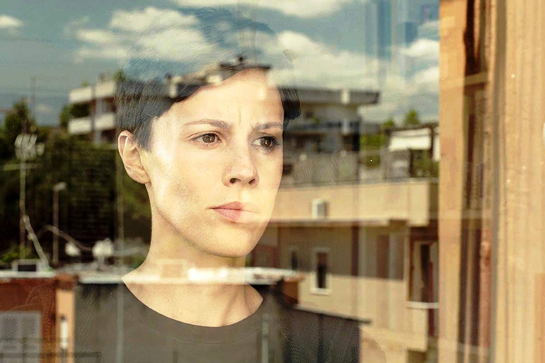 Carolina struggles to cry over her husband's death in "Laughing"