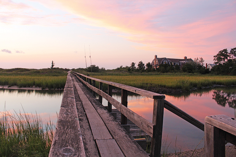 Sunset boardwalk Hamptons