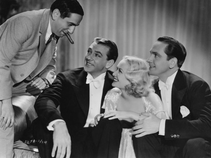 Ernst Lubitsch with Gary Cooper, Miriam Hopkins, and Fredric March, stars of "Deisgn for Living"