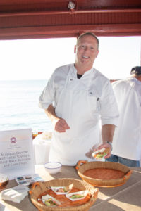 Claudio’s consulting chef, Chef Franklin Becker prepares appetizer