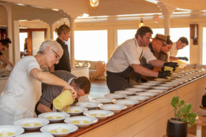 Chefs prepare second course