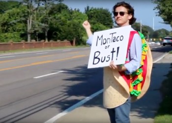 Guy in taco suit hitchhiking with 