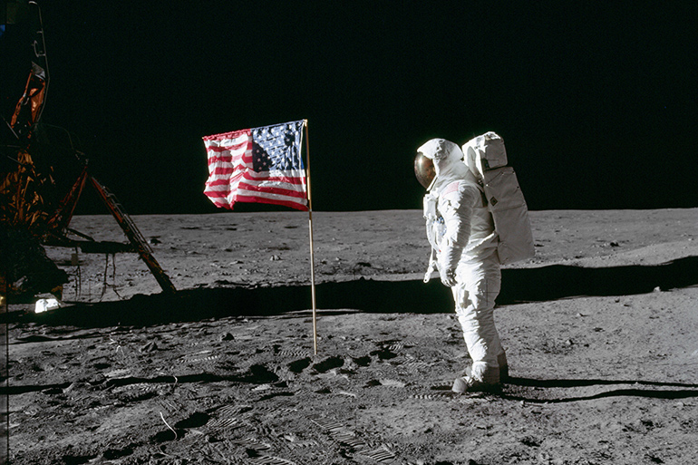 Edwin "Buzz Aldrin" poses with U.S. flag on the Moon