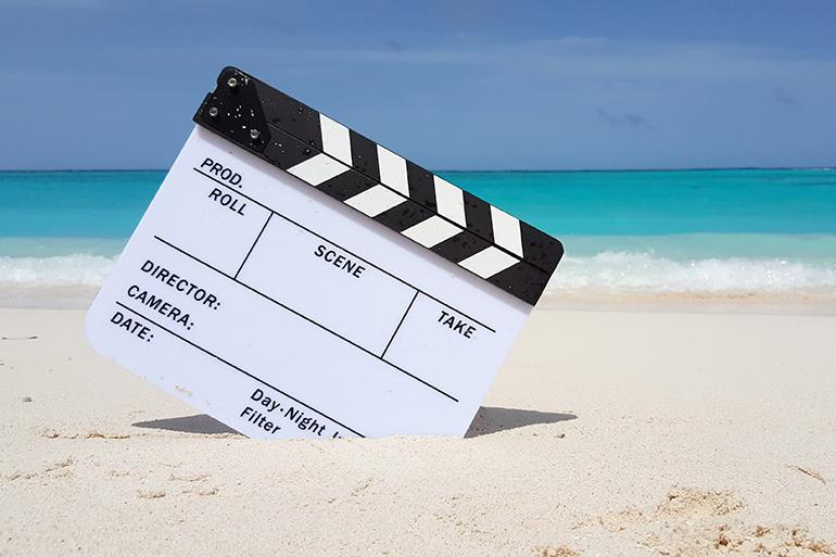 Maldives beautiful beach background white sandy tropical paradise island with blue sky sea water ocean 4k clapperboard film slate action cut