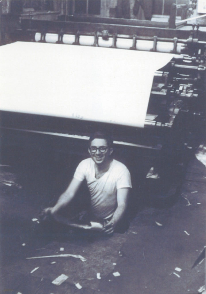 Young Dan Rattiner at the printer