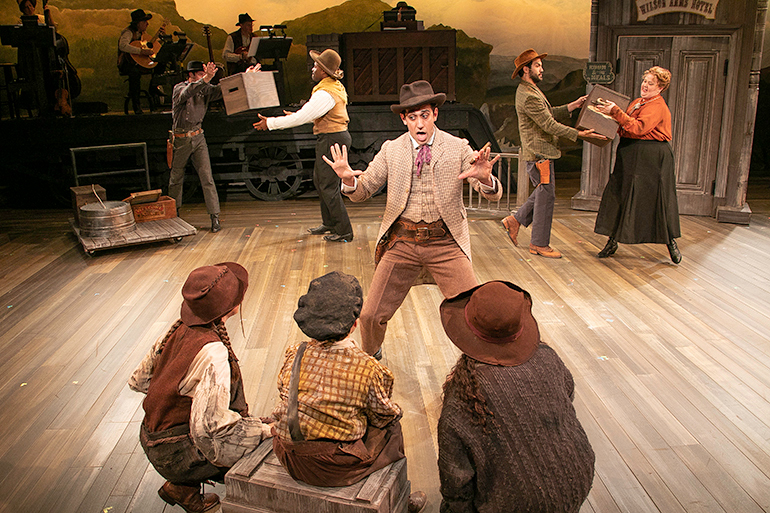 Charlie (George Abud) telling the kids (Isa Mooney, Meaghan McInnes and Will Hantz) about Buffalo Bill, Photo: Lenny Stucker