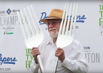 Dan Rattiner holding two giant forks