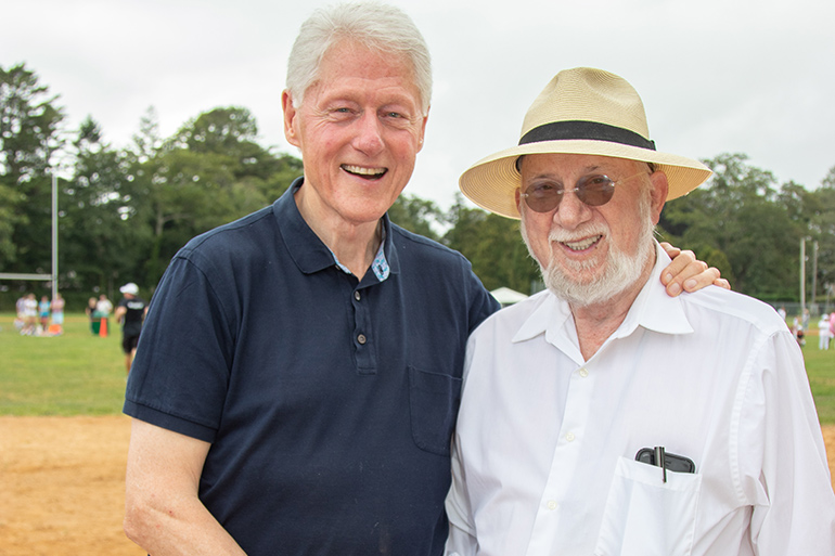 Dan Rattiner and Bill Clinton at the 2019 Artists & Writers Game