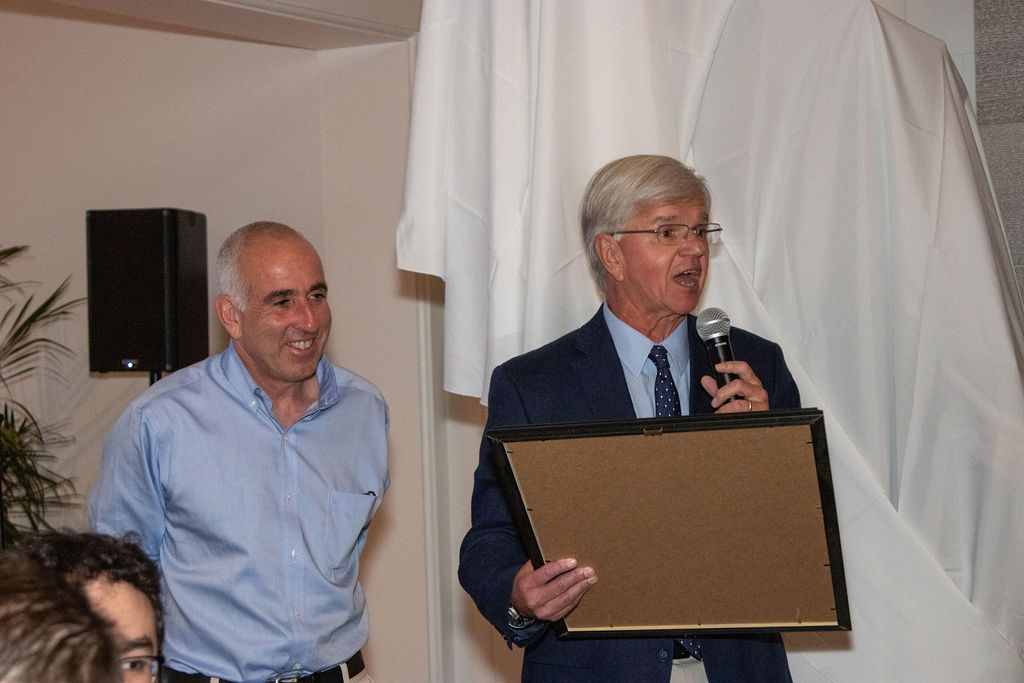 Town Supervisor Jay Schneiderman, Assemblyman Fred Thiele present Dan Rattiner with a Proclamation
