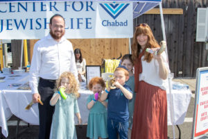 Rabbi Berel Lerman and Brocha Lerman with their children