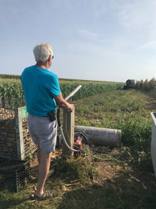 Harry Ludlow firing the corn cannon at the target,