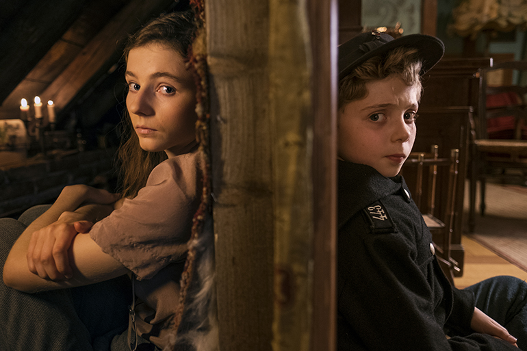Thomasin McKenzie and Roman Griffin Davis in "Jojo Rabbit,"