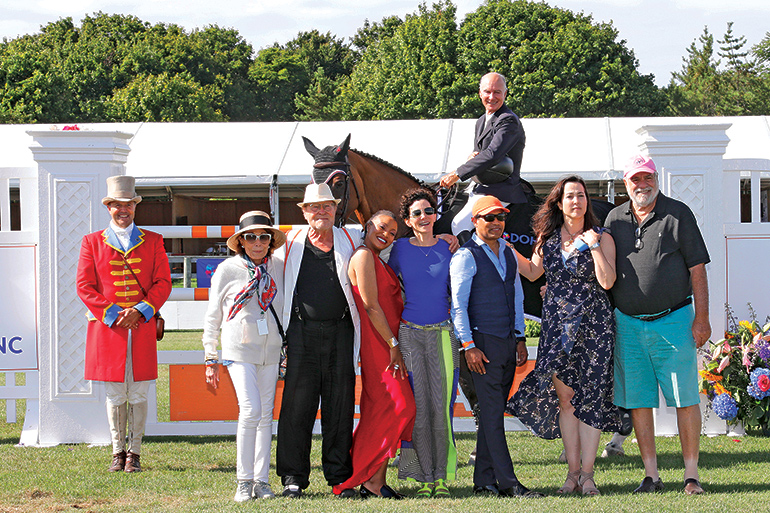 Mario Deslauriers, on Bardolina 2, celebrates his 2019 Hampton Classic Grand Prix victory