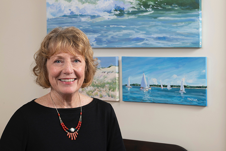 Patricia Feiler with her art