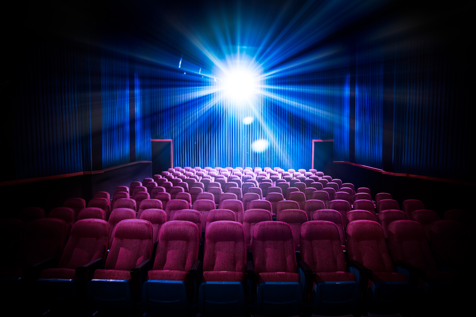 High contrast image of empty movie theater seats