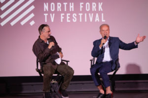 Chris Noth moderating a talk with Kelsey Grammer