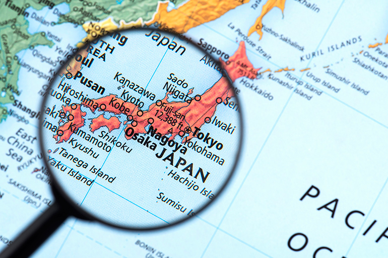Japan map under magnifying glass