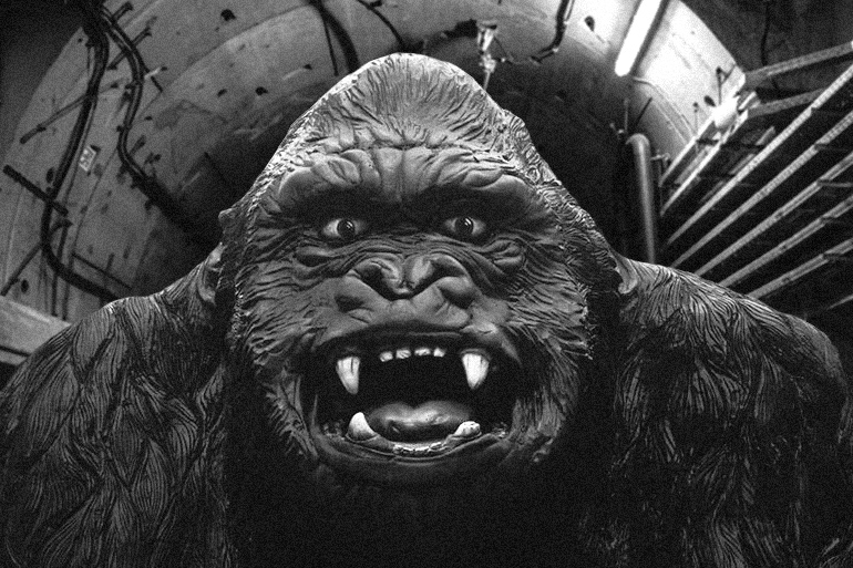 Black and white, grainy King Kong in a Hamptons Subway tunnel