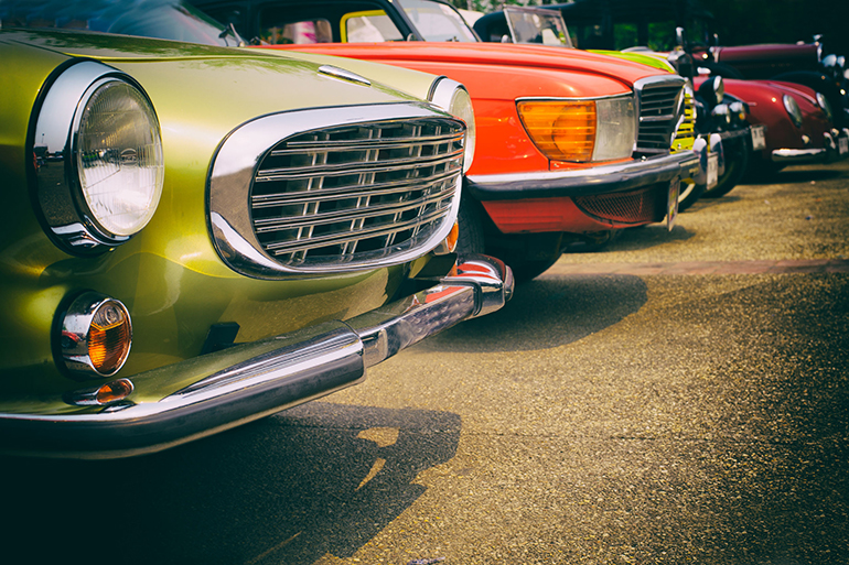 Classic cars in a row - vintage retro color effect style