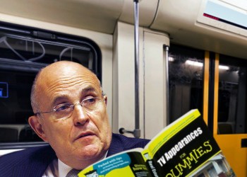 Rudy Giuliani on the Hamptons Subway reading TV Appearances for Dummies