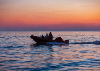 Gardiners Island treasure hunters aboard their skiff