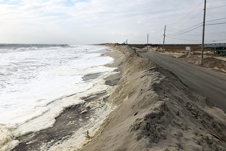 Waters rise to the Dune Road berm on Saturday, December 14, 2019