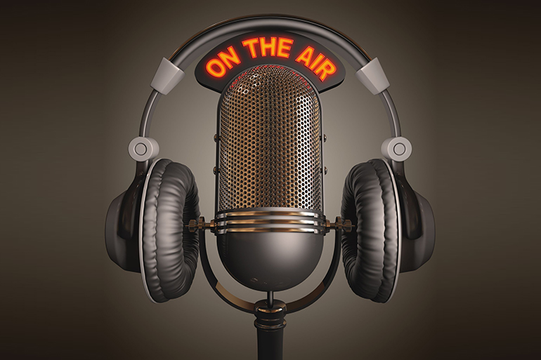 headset on top of a classic microphone.