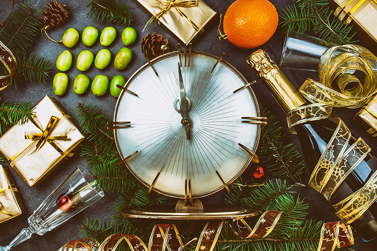NEW YEAR TRADITION. Latin American and Spanish New Year traditional. Funny ritual to eat twelve 12 grapes for good luck at midnigth. Flat lay, top view. Christmas New Year composition