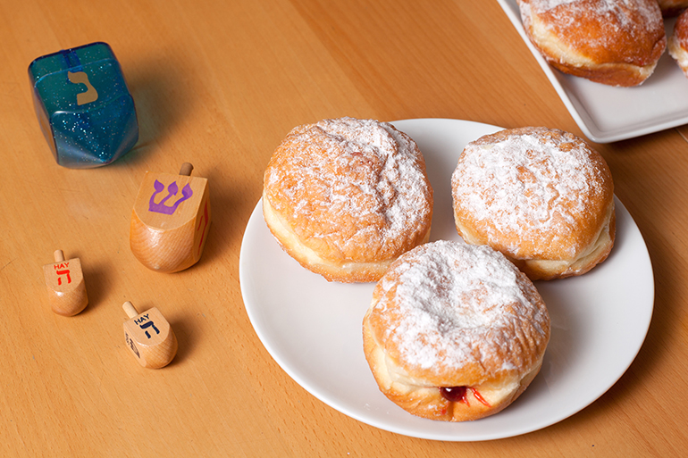 Sufganiyot- Hanukkah Doughnuts and dreidels.