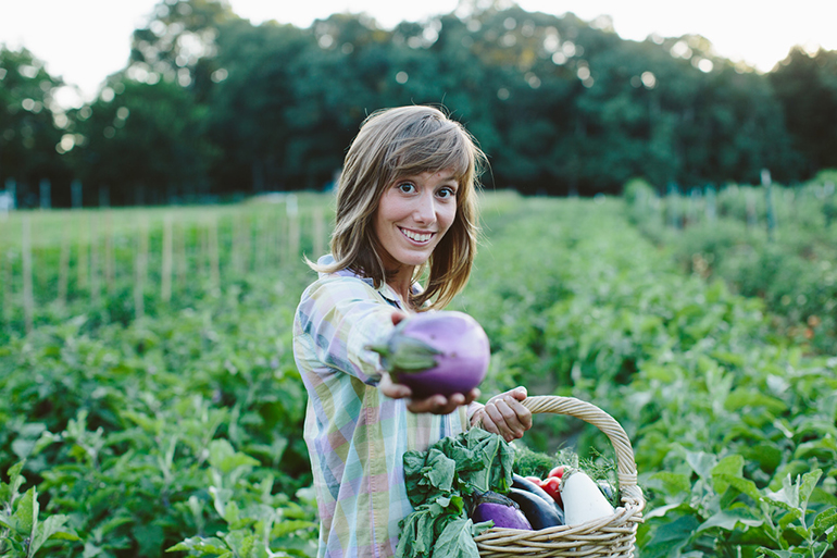 Cristina Cosentino presenting vegetables from Sylvester Manor Educational Farm