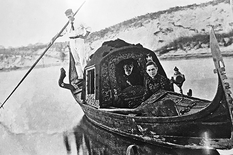 Thomas Moran and Mary Nimmo aboard their Venetian gondola on Hook Pond