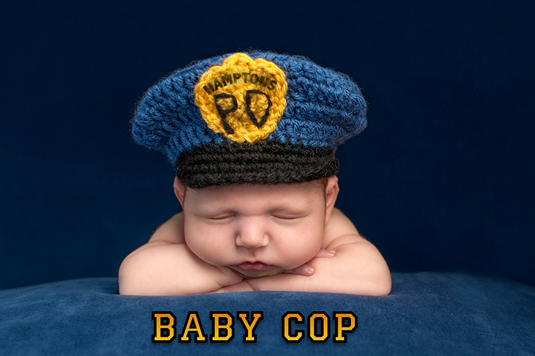 Newborn Baby Boy Wearing a Police Hat