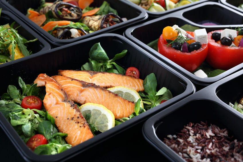 Healthy food and diet concept, restaurant dish delivery. Take away of fitness meal. Weight loss nutrition in foil boxes.