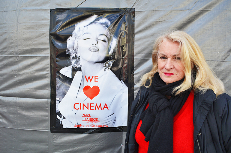 Sag Harbor Cinema Arts Center Executive Director Gillian Gordon in front of the Cinema, currently under construction