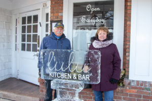 Steve and Debra Schoen in front of Lulu’s Kitchen & Bar
