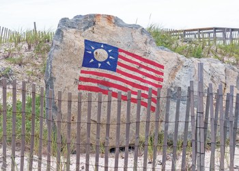 Rock with flag in Hamptons