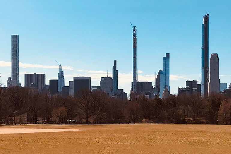 Skyline of tall and skinny buildings under construction near central Park in NYC