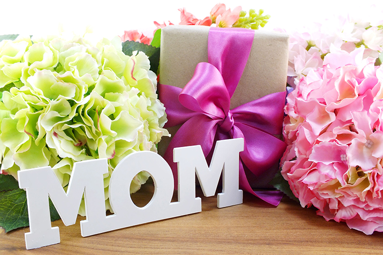 beautiful bouquet of flowers and gift for mother s day