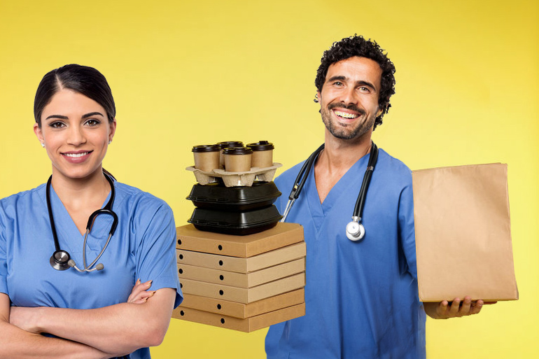 Hospital workers, nurses, with takeout food