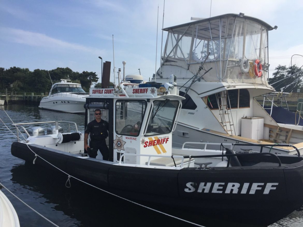 Deputy Sheriff Thomas Lyons, picture here on Marine 1, and Deputy Sheriff Joseph Gallo rescued two small children adrift on a float in Peconic Bay on Monday evening. Independent/Courtesy Suffolk County Sheriff’s Office