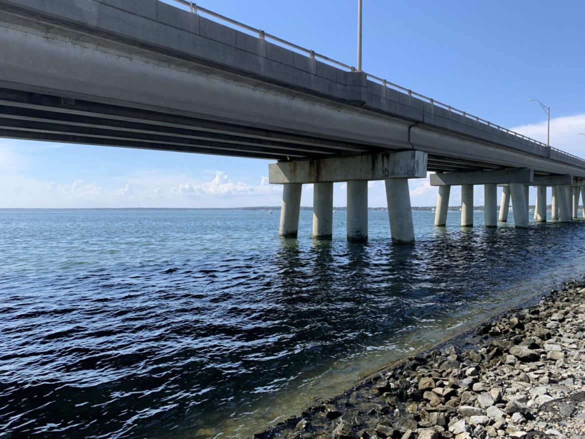 AFTER LAUNCHING FROM THE BOAT RAMP BY THE PONQUOGUE BRIDGE, TWO MEN FROM QUEENS HAD TO BE RESCUED FROM THE WATER WHEN THEIR BOAT OVERTURNED SUNDAY. PHOTO BYTAYLOR K. VECSEY