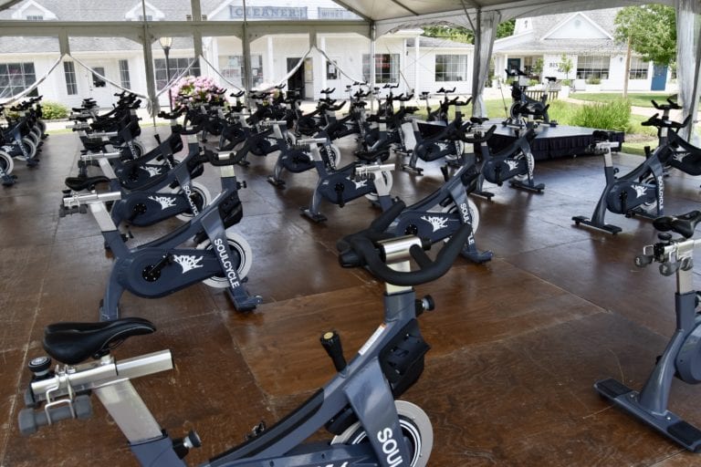 SOULCYCLE'S OUTDOOR SET UP IN WATER MILL. INDEPENDENT/JAMES J. MACKIN