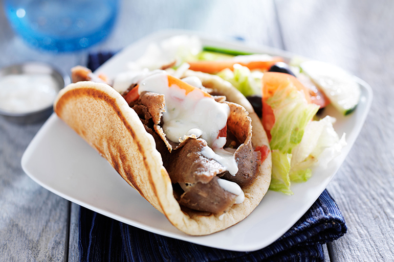 gyro with greek salad and tzatziki sauce